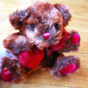 Plush Bear holding heart by Dan Dee